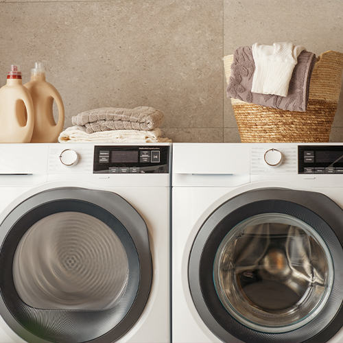 lifestyle image of washing machine and tumbler dryer
